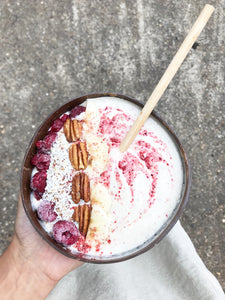 Berry Yoghurt with bamboo straw in a coconut bowl!
